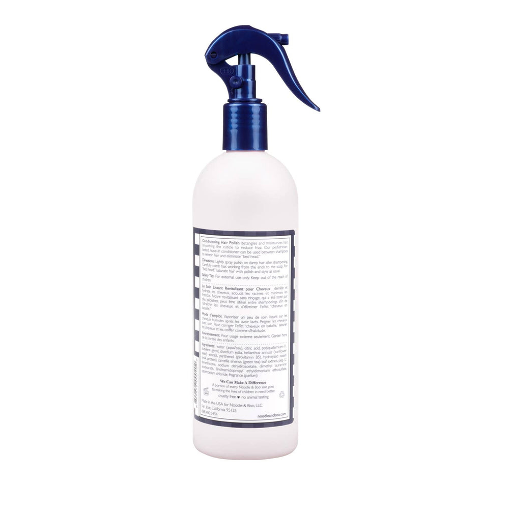 White spray bottle with a blue nozzle on a white background