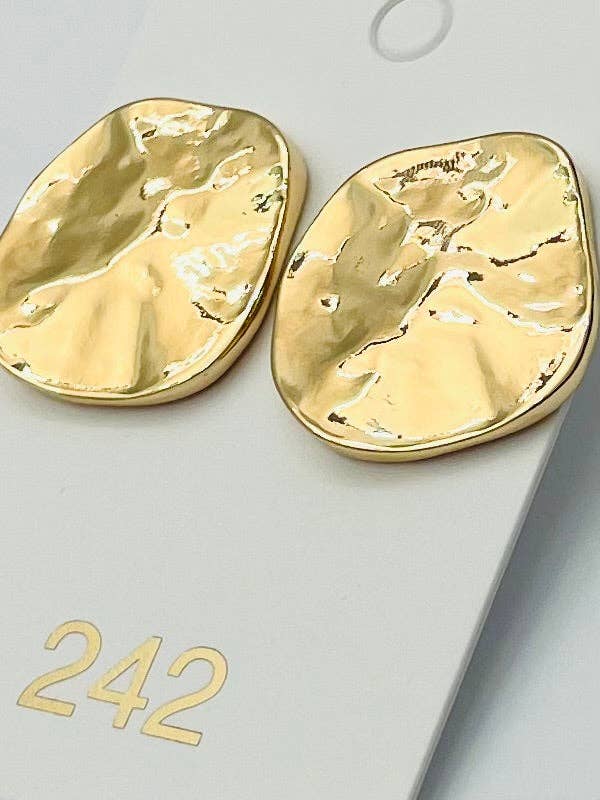 Gold earrings on a light gray background with '242' visible.