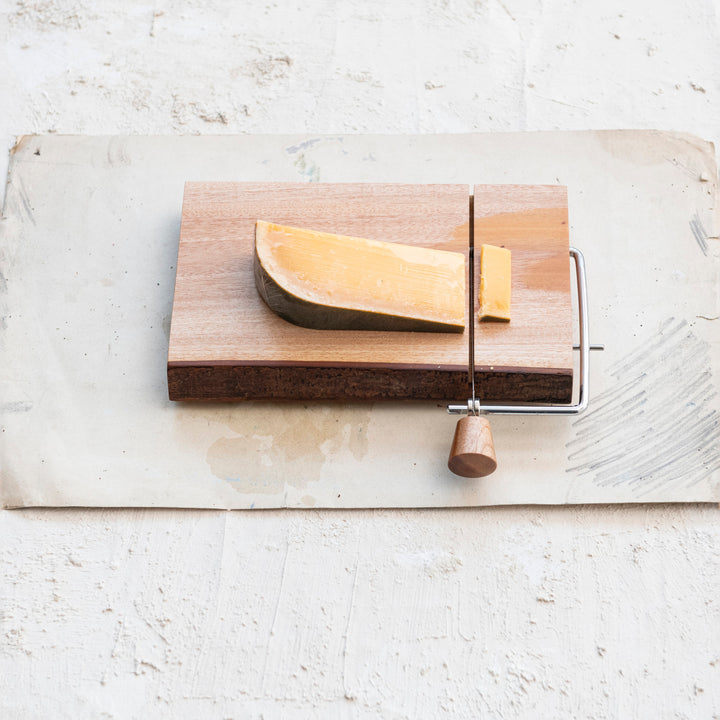 CHEESE SLICER WITH BARK EDGE