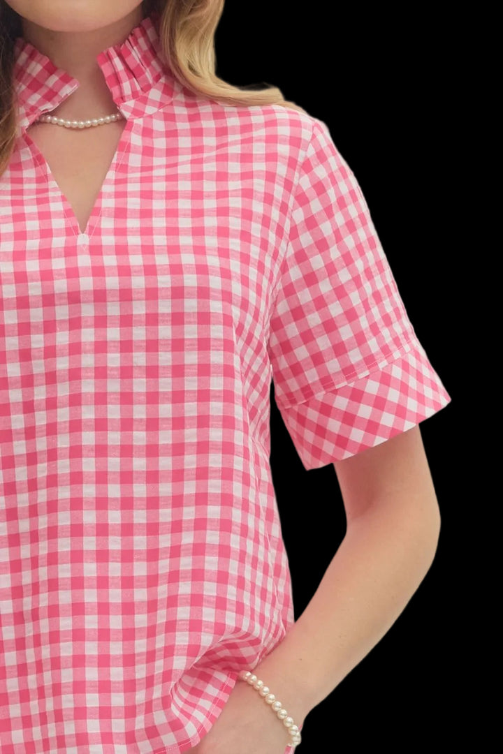 HOT PINK AND WHITE GINGHAM SHORTSLEEVE BLOUSE ON MODEL WITH UP CLOSE SLEEVE DETAIL