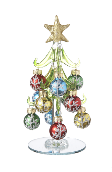 Decorative Christmas tree made of glass with colorful ornaments and a gold star on a white background