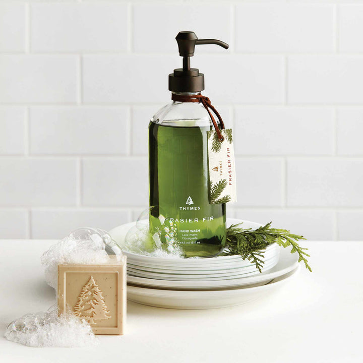 Frasier Fir bar soap displayed with coordinating evergreen bath products