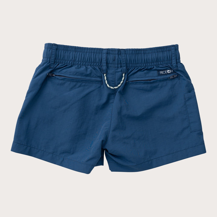 Blue shorts with a brand logo on a light gray background