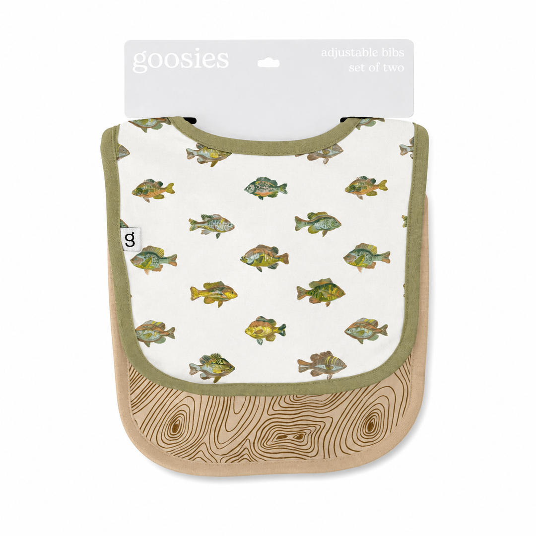 Children's bib with fish pattern and wooden texture, branded 'goosies'.