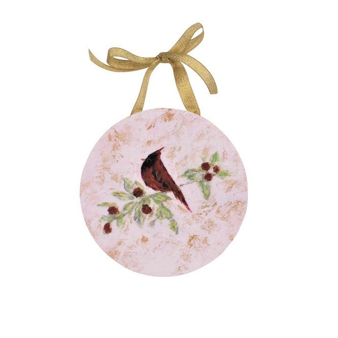 Round decorative ornament with a bird and berries design, attached to a gold ribbon on a white background.