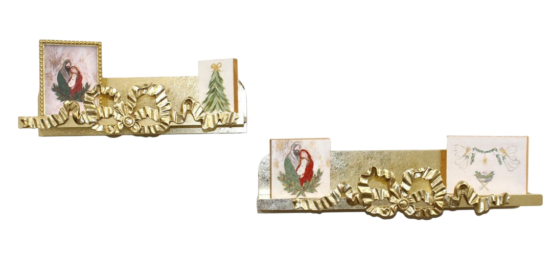 Decorative gold shelves with Christmas-themed cards on a plain background