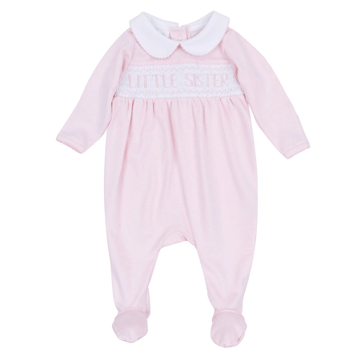 Pink baby onesie with white collar on a white background