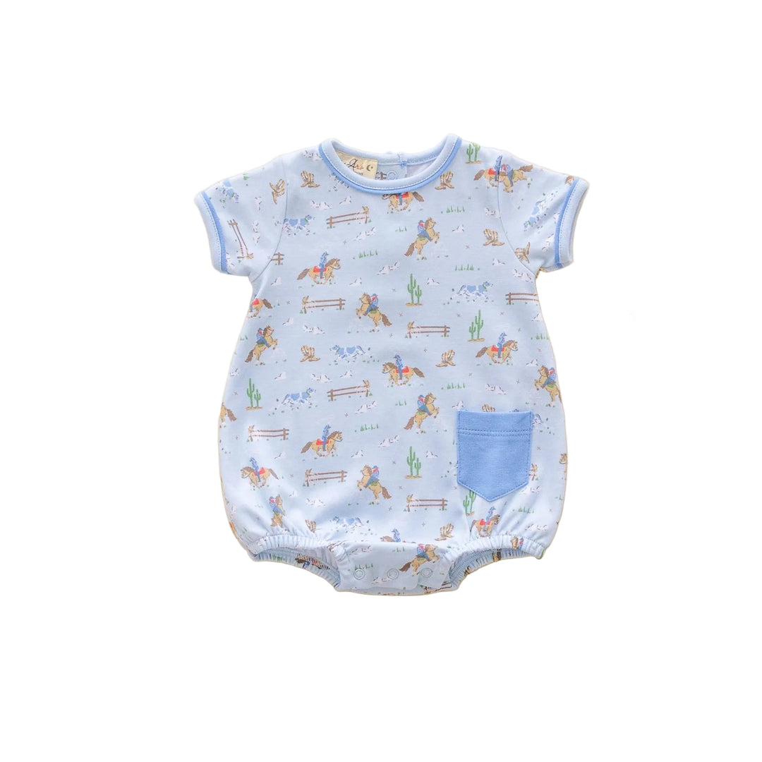 Light blue baby bubble romper with cowboy and horse western print, short sleeves, and blue pocket detail | Walker Boutique