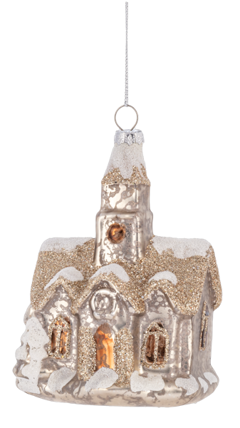 Decorative glass ornament of a snowy village with a church, gold and silver glittery finish.