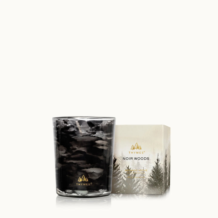 Thymes Noir Woods 2 ounce votive candle in black and grey glass with box