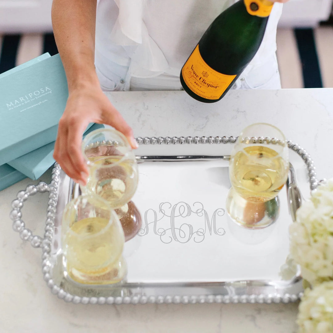 wine glasses on pearledd tray