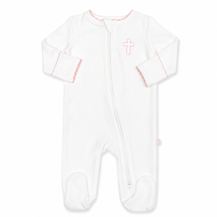 White baby onesie with pink accents and a cross design on a white background