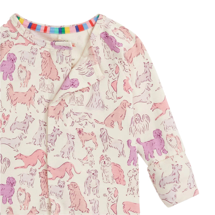 Children's long-sleeve coverall pajamas with pink dog pattern on a white background