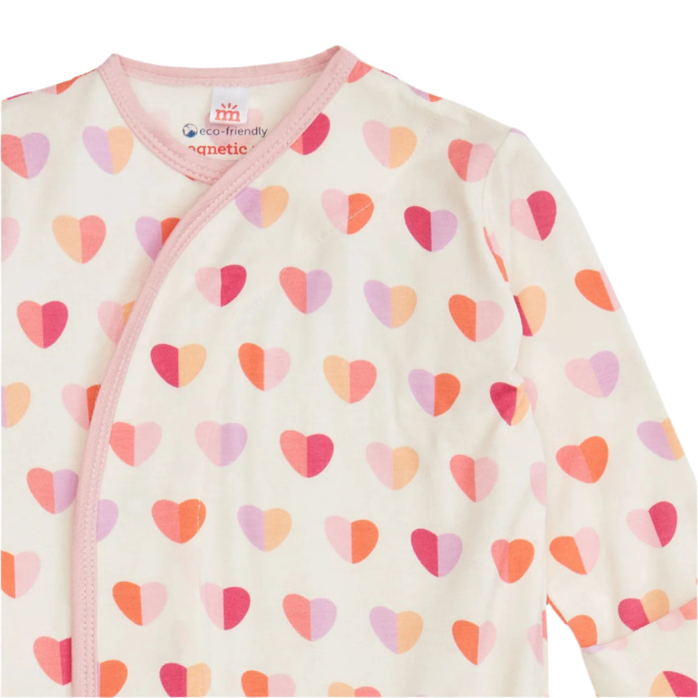 Baby gown with heart pattern on a white background
