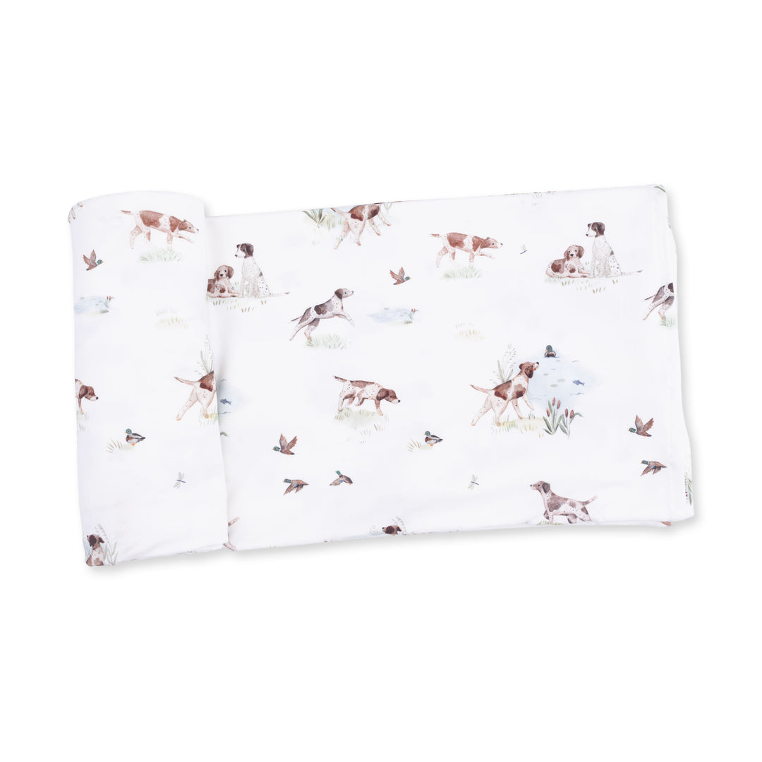 Angel Dear Pointer Pups and Duck Buddies Swaddle Blanket displayed to show the full baby blanket and pointer pups and duck buddies design
