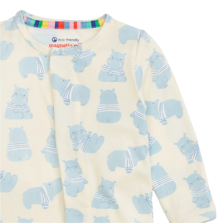 baby boy footie with blue hippos on white background