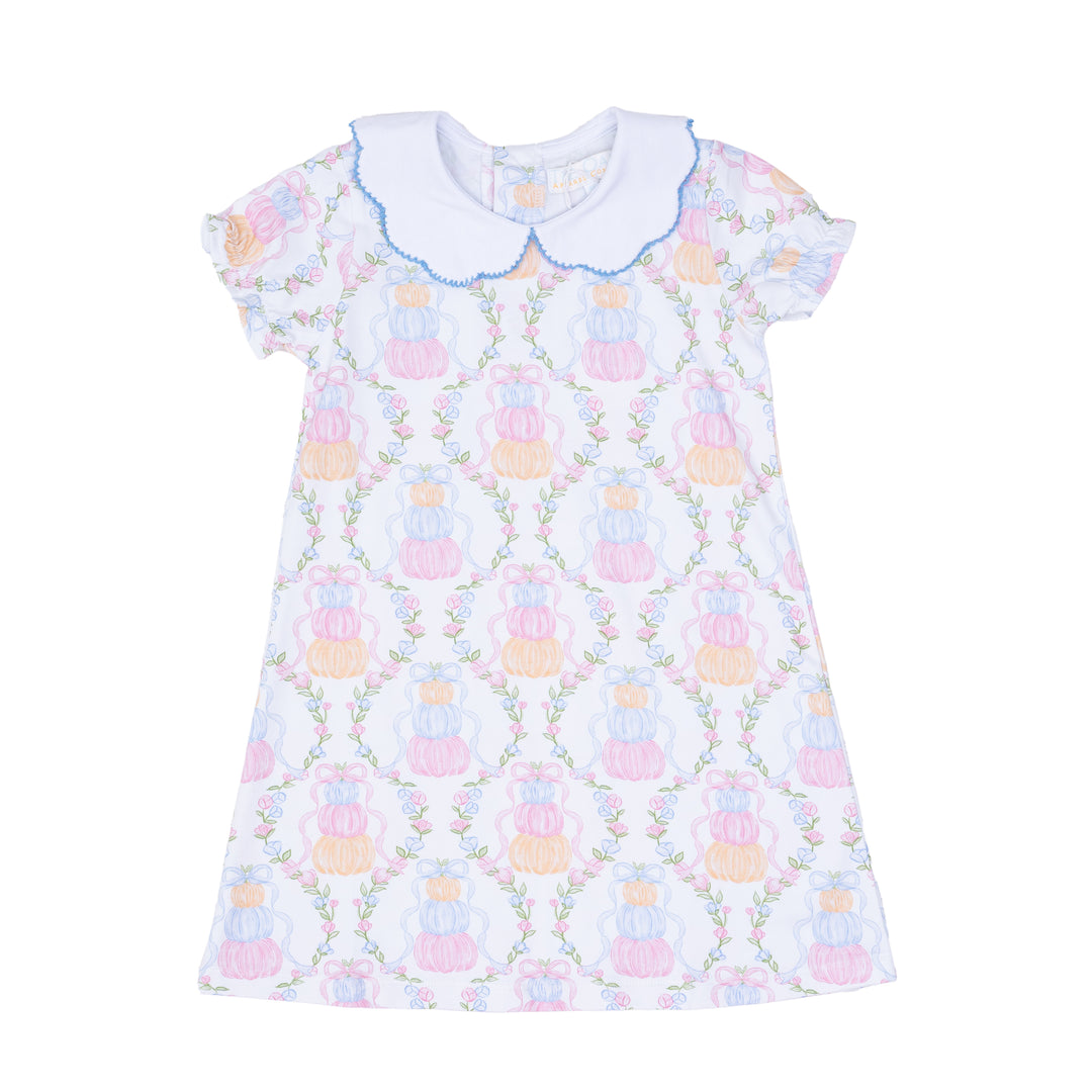 Children's nightgown with pastel floral pattern on a white background