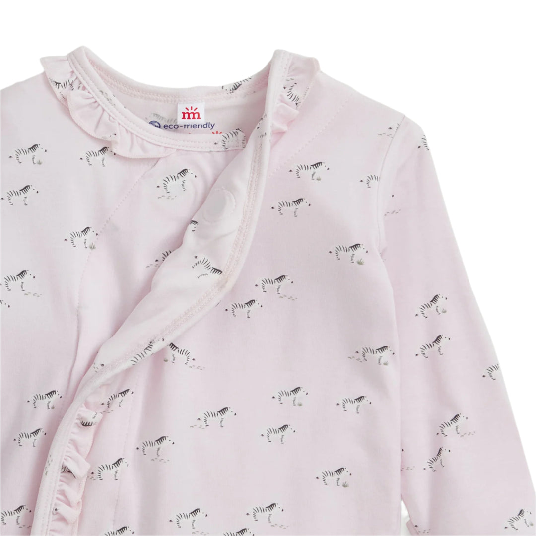 Baby gown with zebra pattern on a light pink background