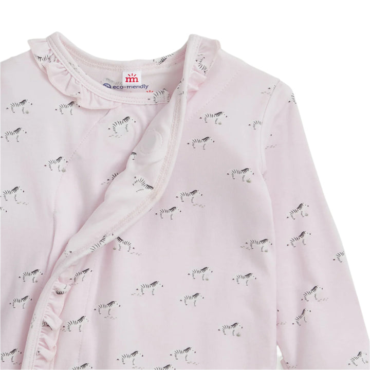 Baby gown with zebra pattern on a light pink background