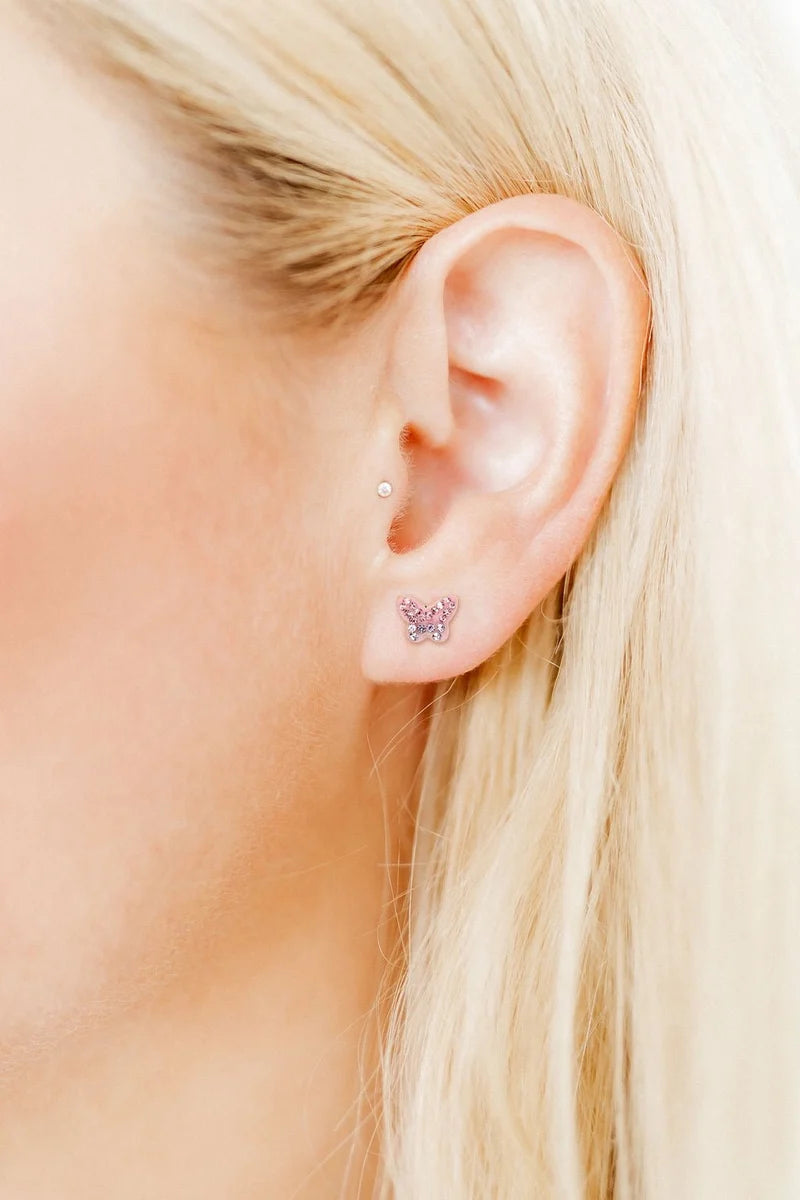 Bindi pink crystal butterfly screwback stud earring worn on the ear