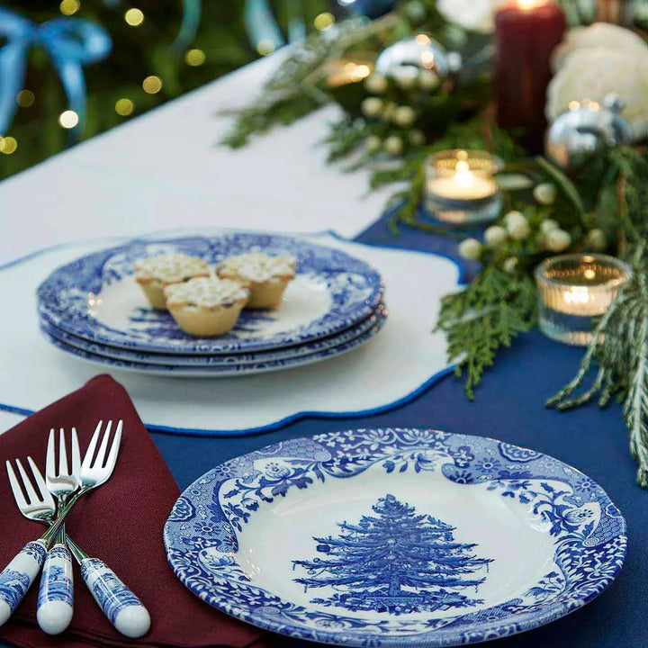 blue and white plate on table 