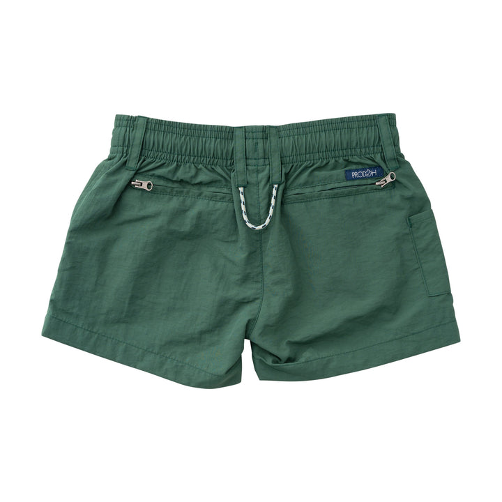 Green shorts with a brand label on a white background