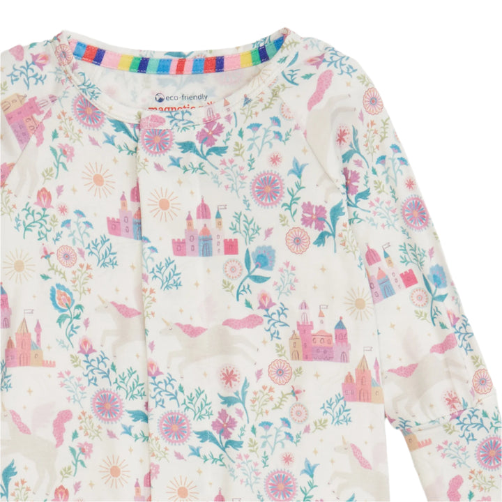 Children's long-sleeve coverall with castle and floral pattern on a white background