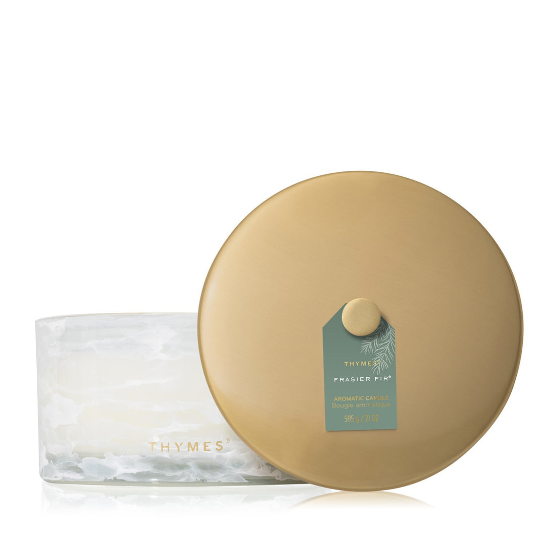 Frasier Fir Tidings 21 ounce four-wick candle in white marbled glass with oversized gold lid