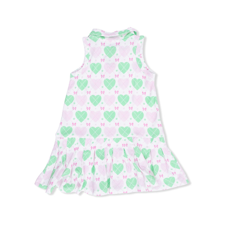 Children's sleeveless dress with green heart and pink bow pattern on a white background