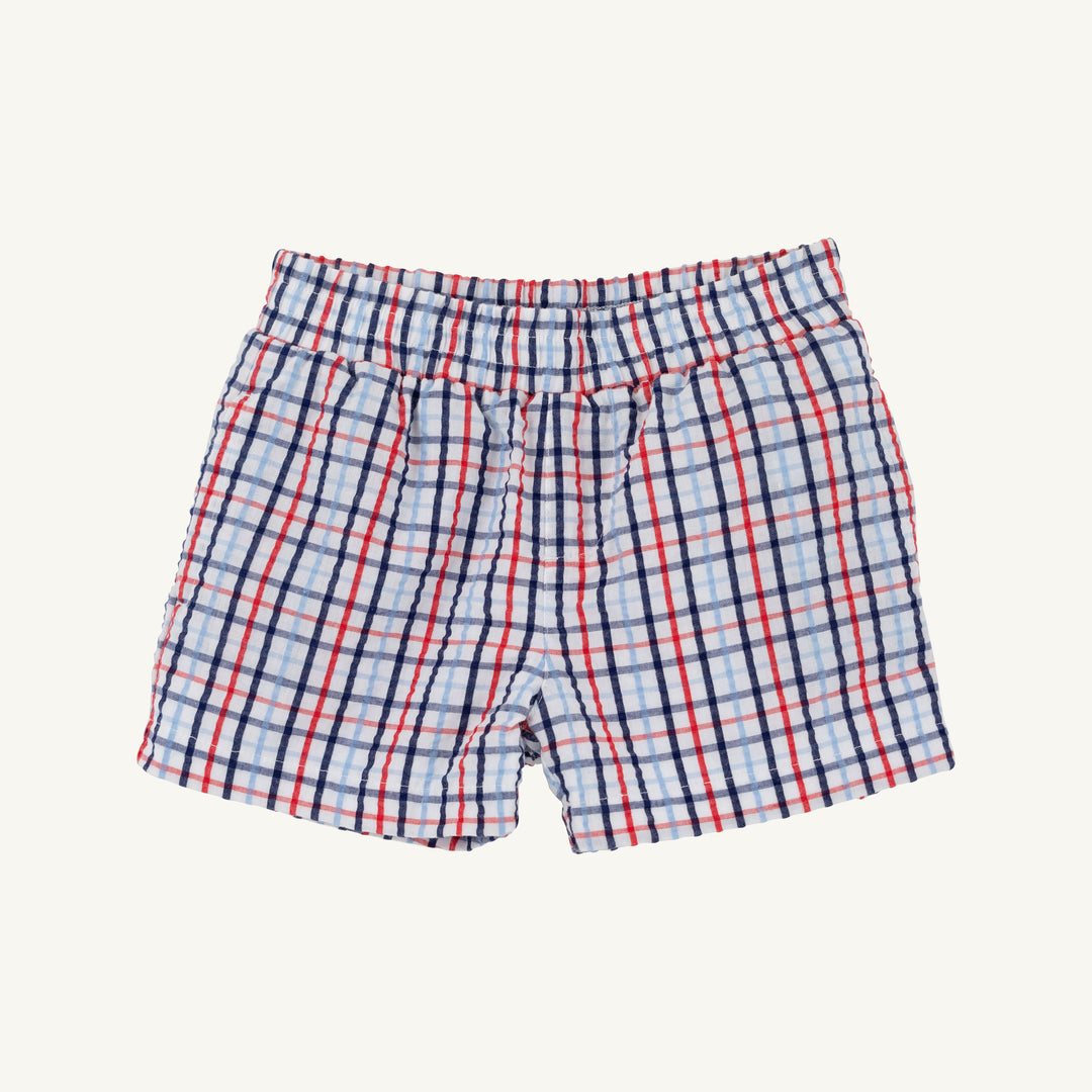 Plaid shorts with red and blue lines on a white background