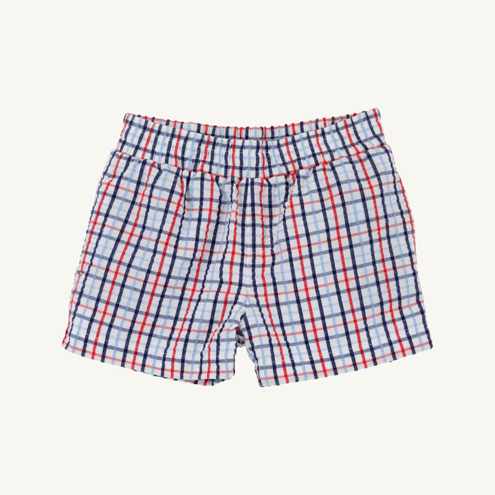 Plaid shorts with red and blue lines on a white background