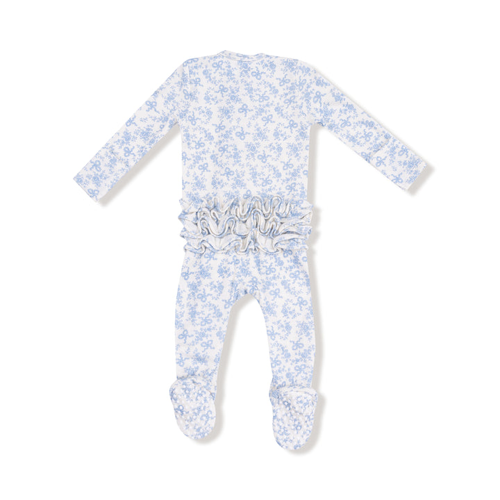 Baby onesie with blue floral pattern and silver bow on a white background