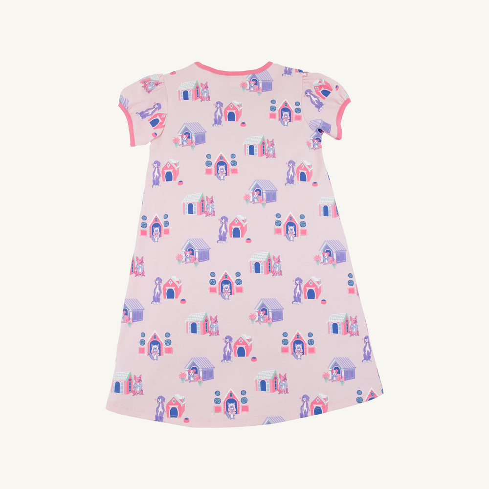 Children's dress with puppy pattern on a white background