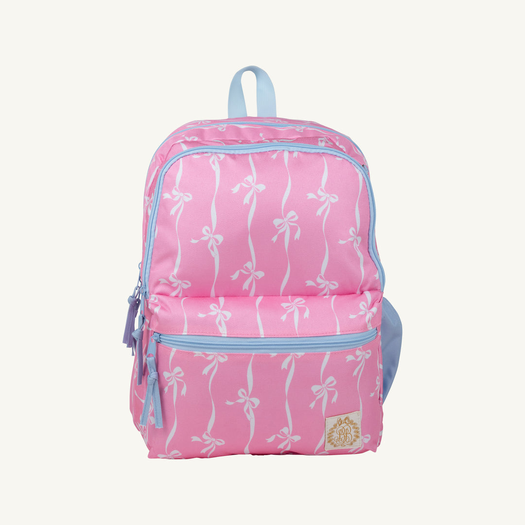 PINK KIDS BACKPACK WITH WHITE STRIPES AND BOWS WITH BLUE TRIM