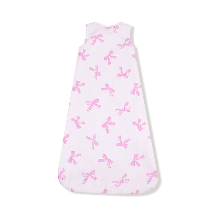 Baby sleeping bag with pink bow pattern on a white background