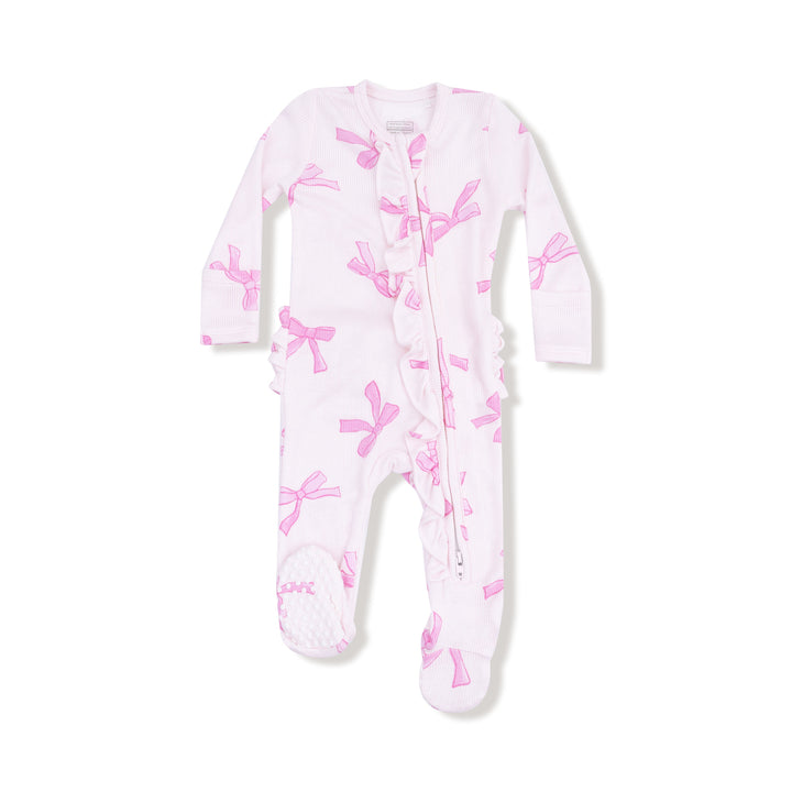 Baby onesie with pink bow pattern on a white background