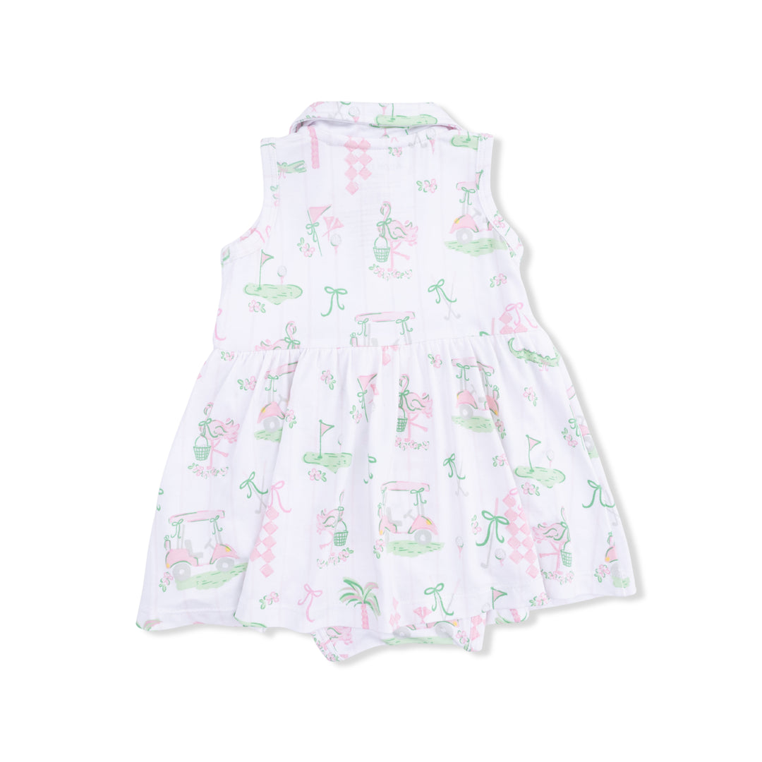 White dress with colorful flamingo pattern on a white background