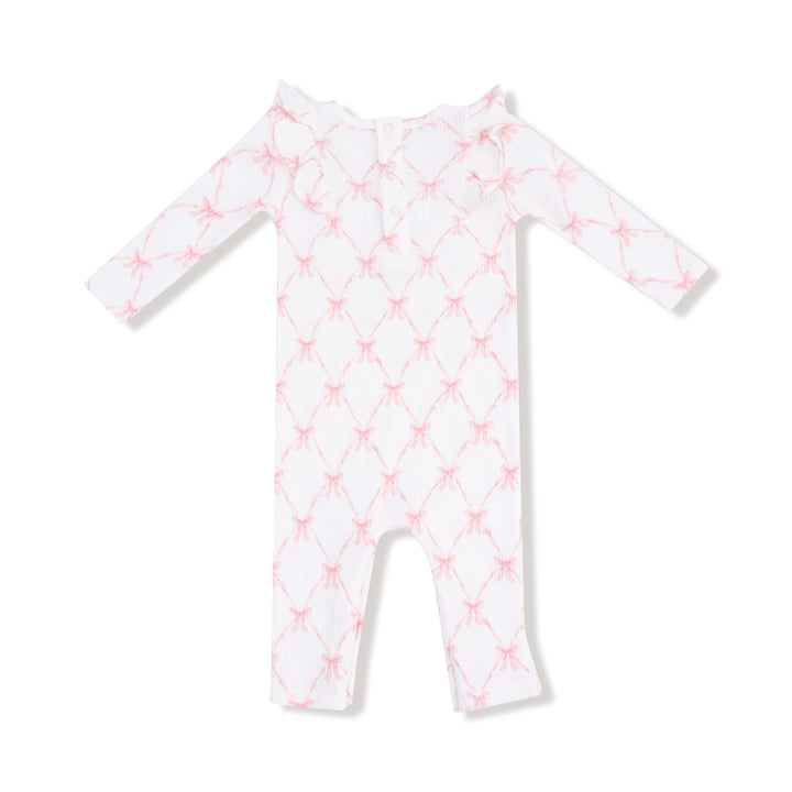 White baby onesie with pink star pattern on a white background