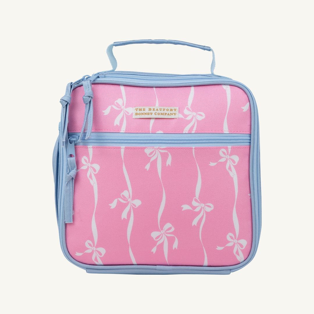 PINK LUNCH BOX WITH WHITE BOWS AND STRIPES WITH BLUE TRIM