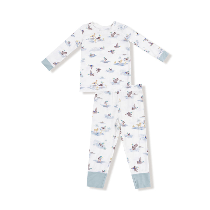 Children's pajama set with animal pattern on a white background