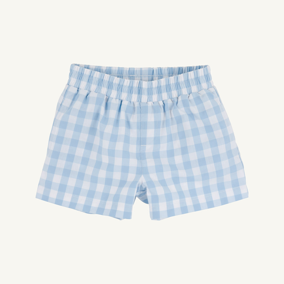 Blue and white checkered shorts on a light gray background