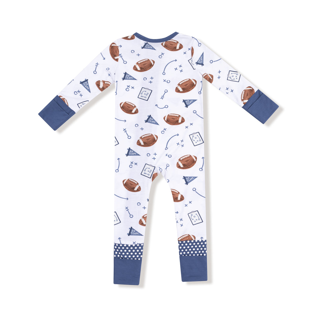 Children's onesie with football pattern on a white background