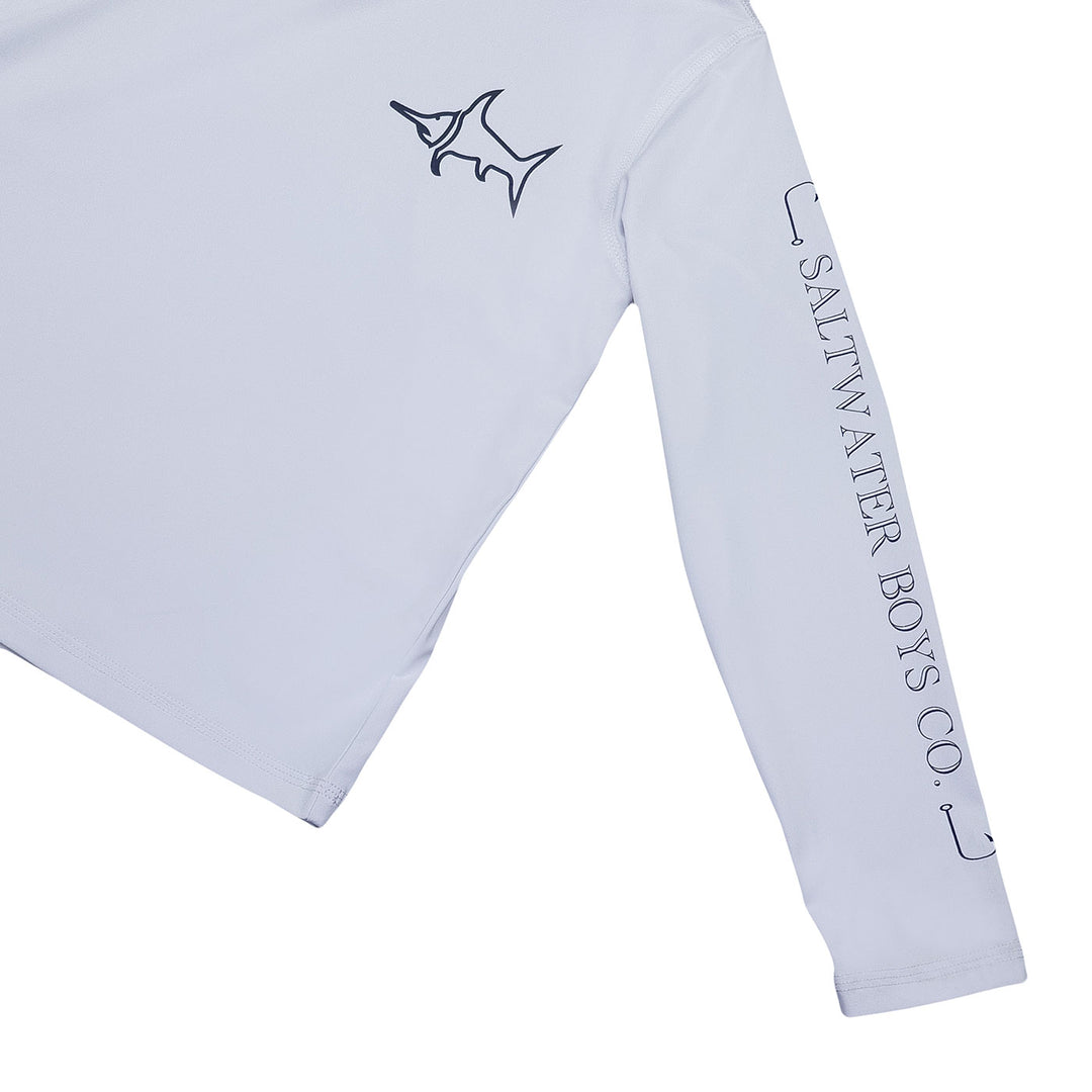 White long-sleeve shirt with branding on a white background