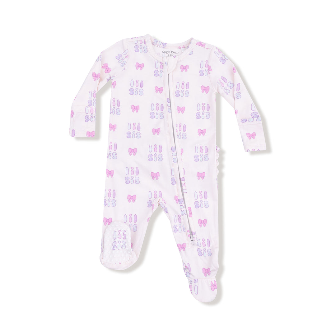 Baby onesie with bow pattern on a white background