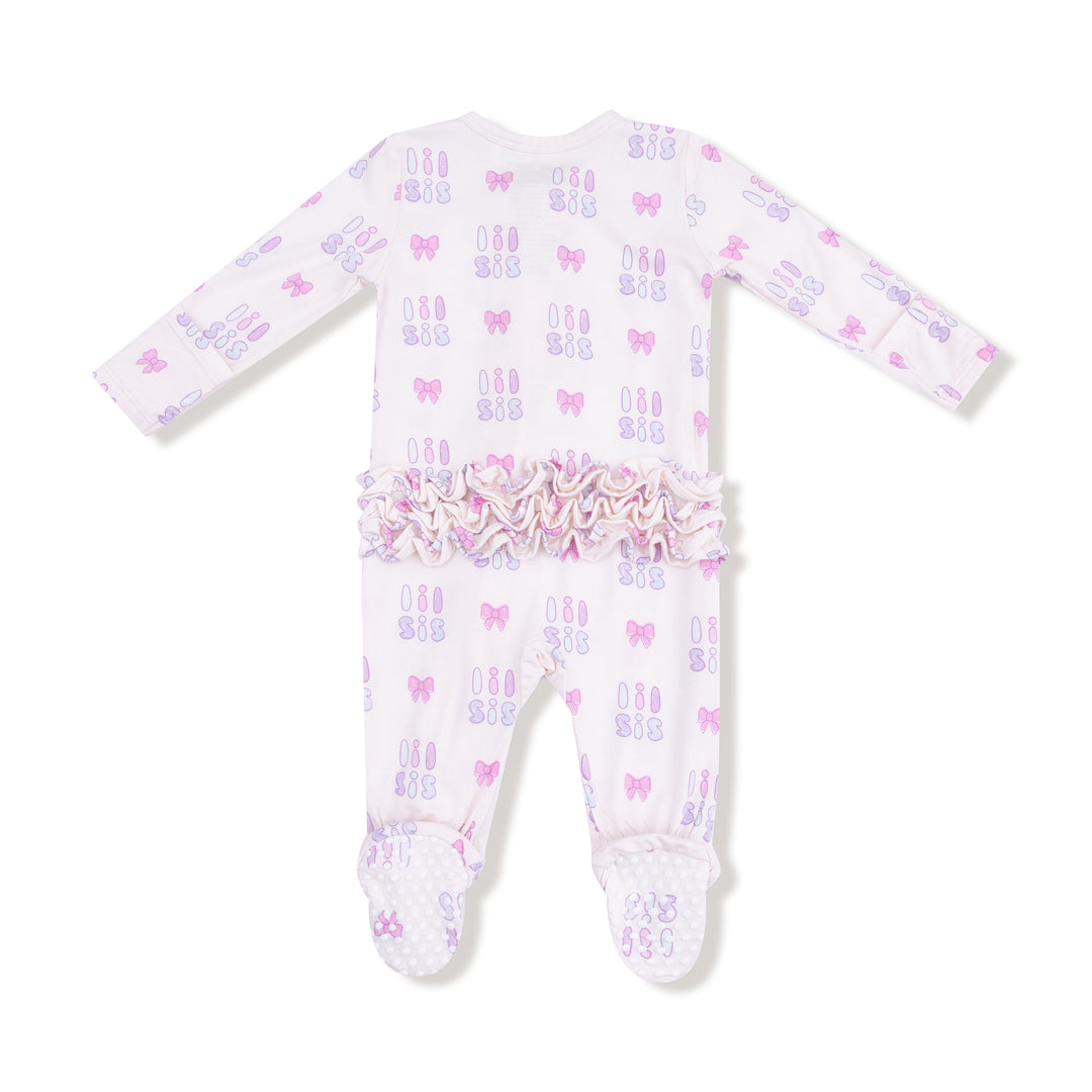 Baby onesie with bow pattern on a white background
