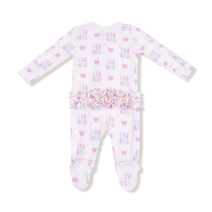 Baby onesie with bow pattern on a white background