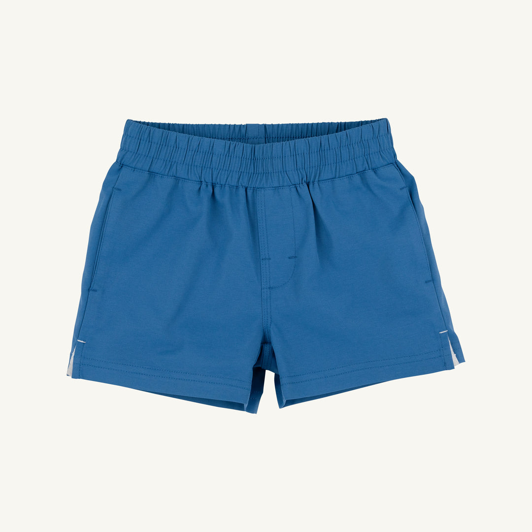 Blue shorts on a light gray background
