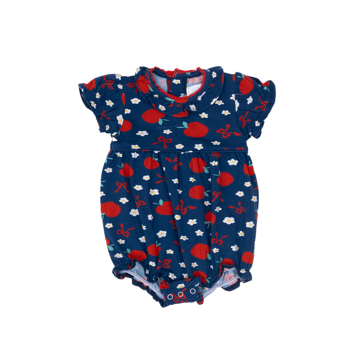 Baby romper with red apple pattern on a blue background