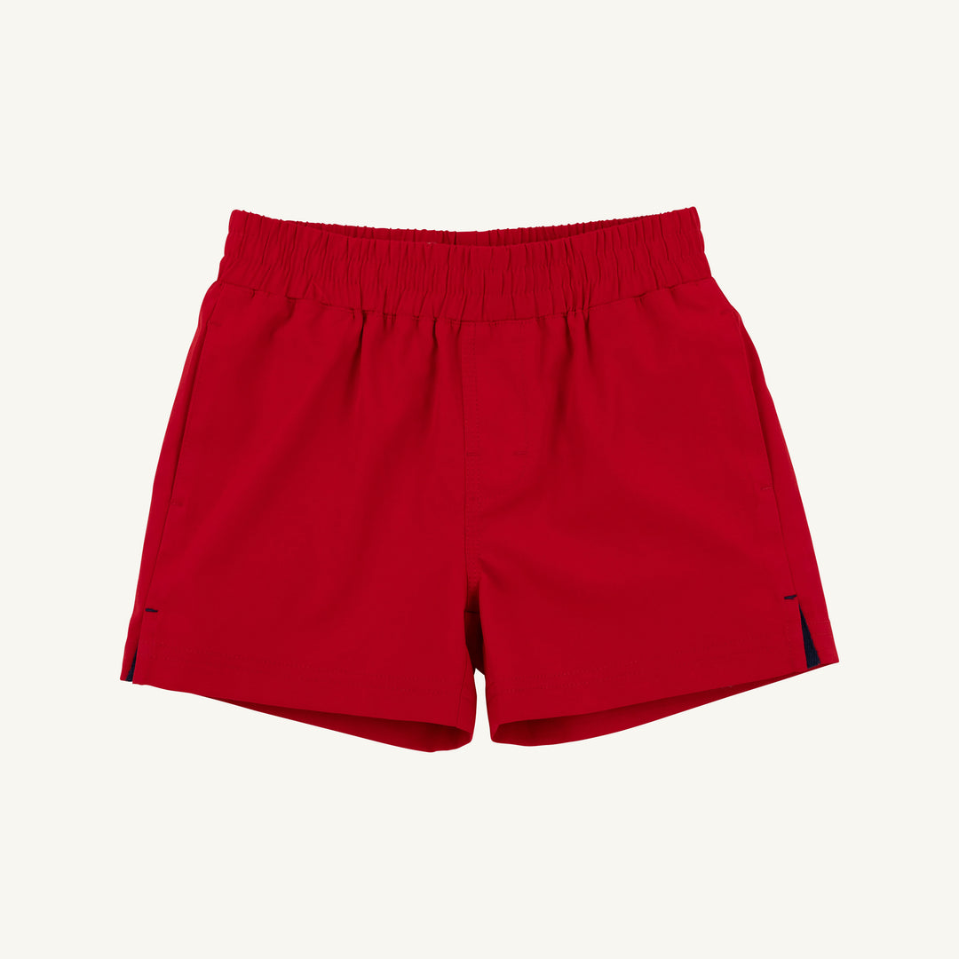 BOYS RED ATHLETIC SHORTS ON WHITE BACKGROUND