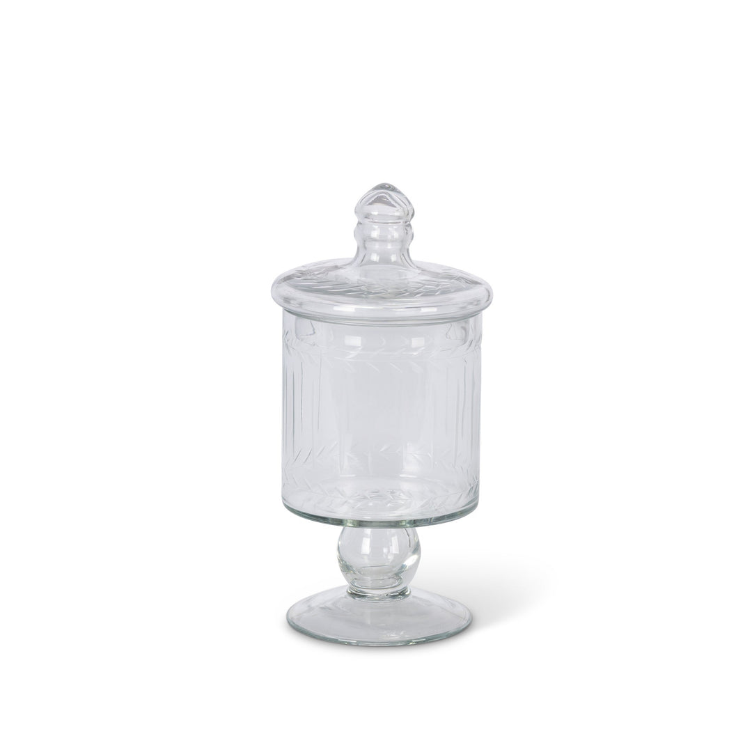 Small clear glass decorative jar with footed base and lidded finial